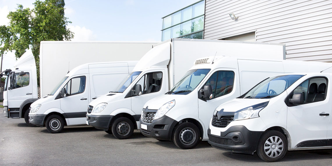 Several types of delivery vehicles are lined up ready to transport medical goods.