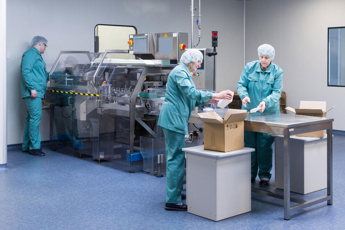 pharmaceutical technicians work sterile working conditions pharmaceutical factory scientists wearing protective clothing